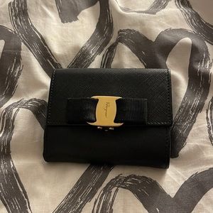 SOLD Authentic Ferragamo black wallet